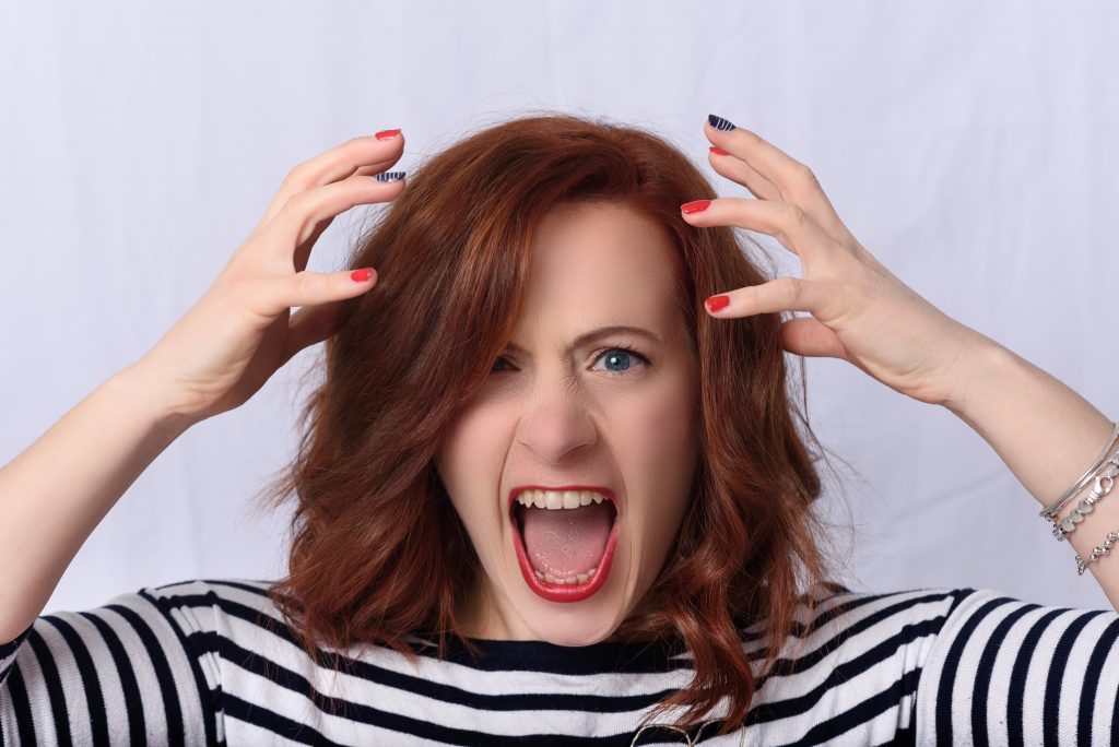 Woman expressing anger emotion