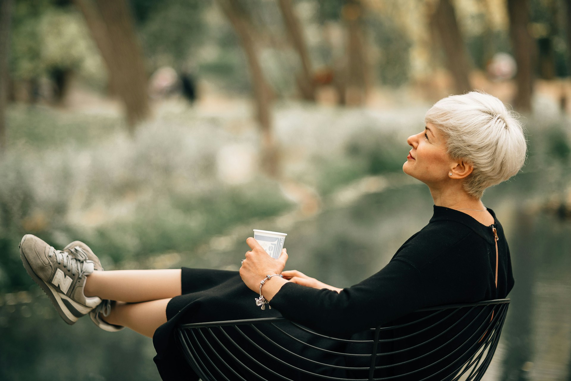 dmitriy-frantsev-xp8F9vqF8Yw-unsplash – Janet Mize Midlife woman in chair gazing at nature